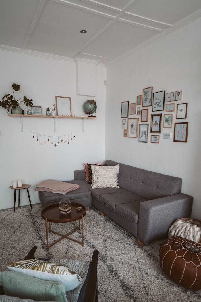 A modern living room with a sectional sofa and wall art for a warm, cozy ambiance.